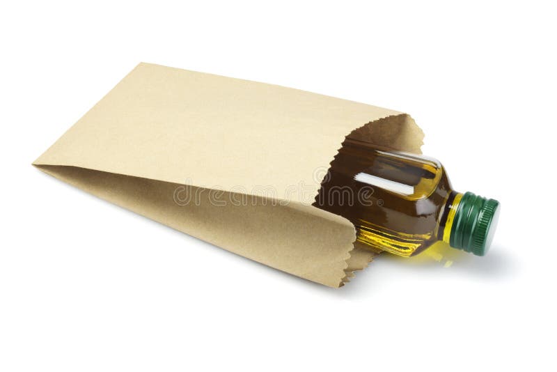 Bottle Of Olive Oil in Paper Bag royalty free stock photography