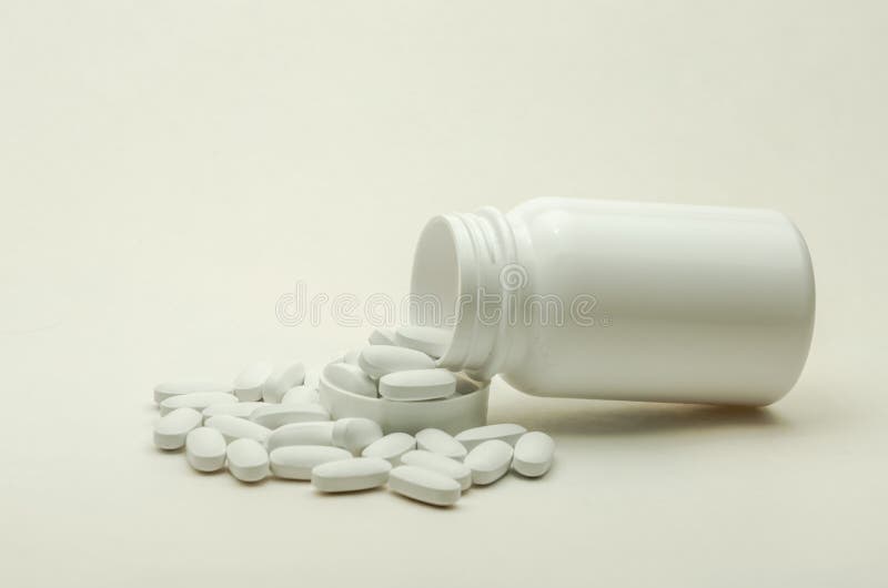 Bottle with pills isolated on white background