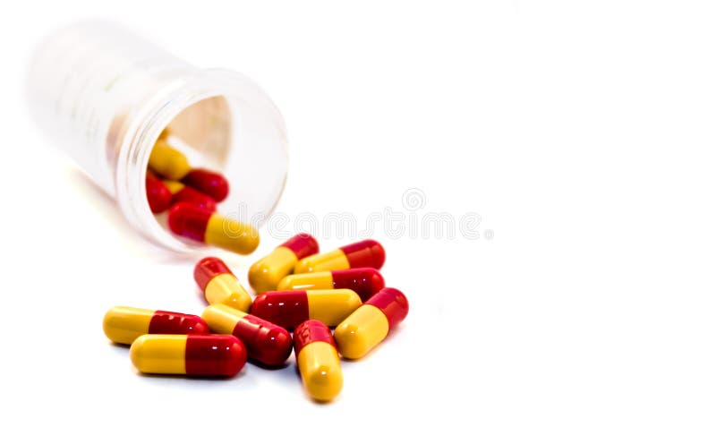 Bottle of pills on a withe background