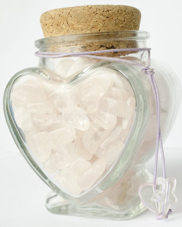 A Bottle of Pink Quartz in a Heartshaped Bottle Stock Photo Image of