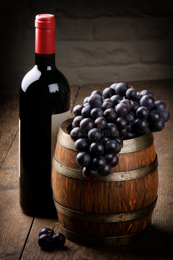 Bottle of red wine, barrel and grape stock photography Bottle of red wine, barrel and grape stock photography