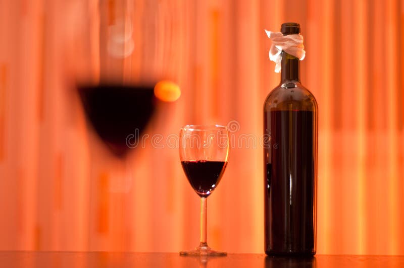 Bottle of red wine and glasses