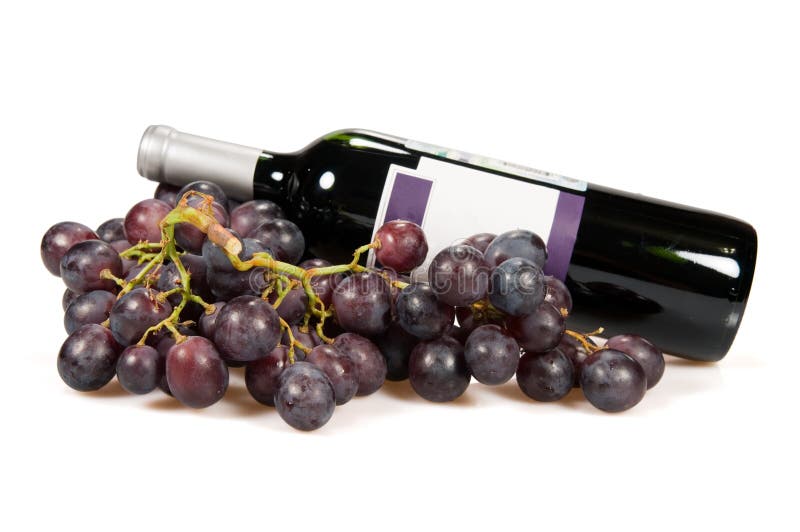 Bottle of red wine and grapes