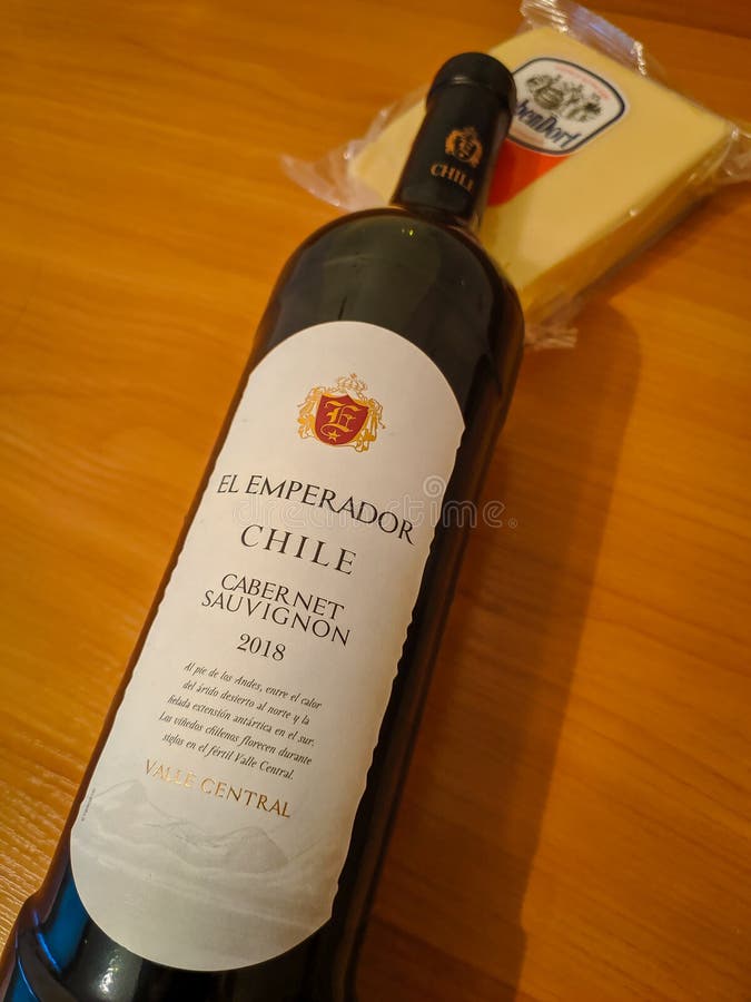Bottle with Red Wine Lie on Its Side with Cheese on the Table, Top View Editorial Photo Image