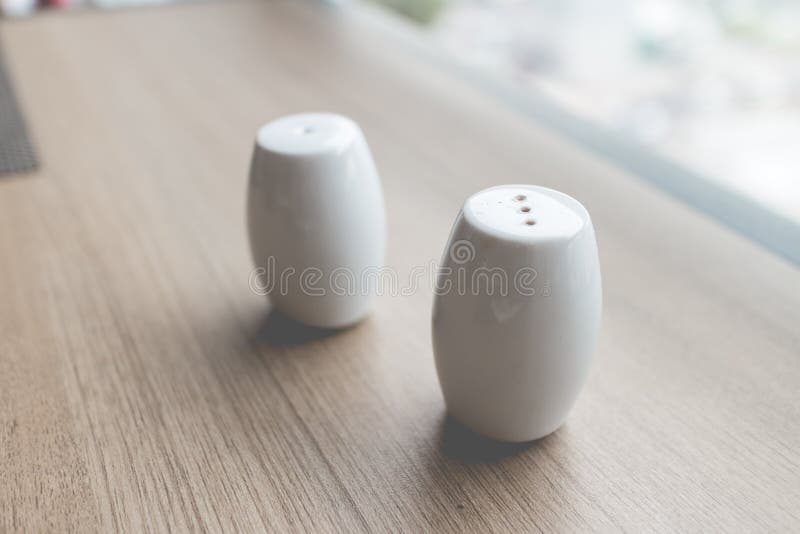 The Bottle of Salt and Pepper on Dining Table Stock Image Image of