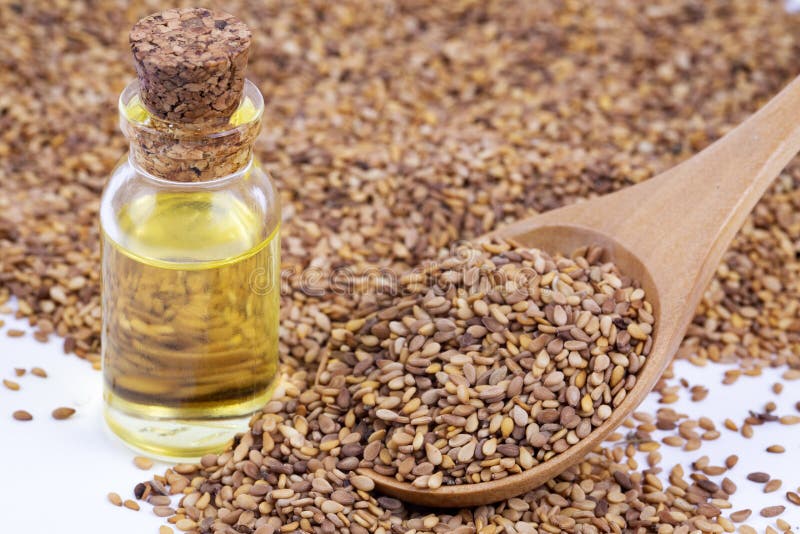 Bottle of Sesame Oil and Sesame Seeds Stock Photo Image of wooden