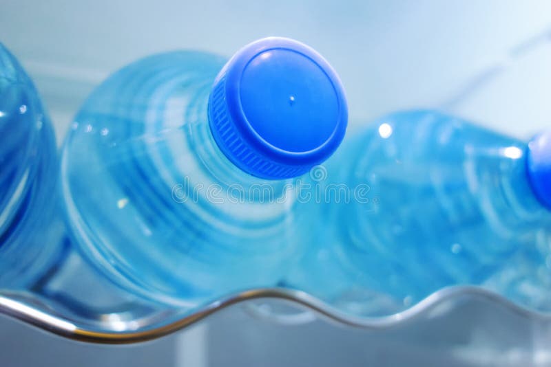 Fresh And Chilled Bottles Of Drinking Water In The Fridge Stock Photo,  Picture and Royalty Free Image. Image 84643878.