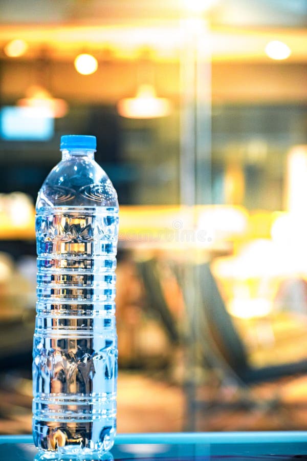 Bottle Water Made To Plastic on Blurry  Wallpaper for  Package or Product, Refreshing Image and Copy Space. Stock Photo - Image of  macro, cool: 101790556