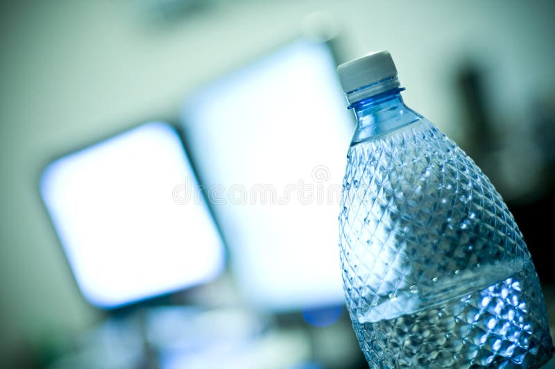 Bottle of water at office stock image. Image of container 4151669