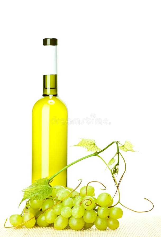 Bottle of white wine and green grapes