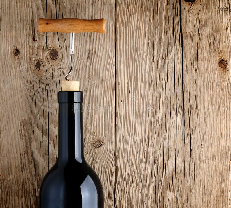 Bottle of wine with corkscrew