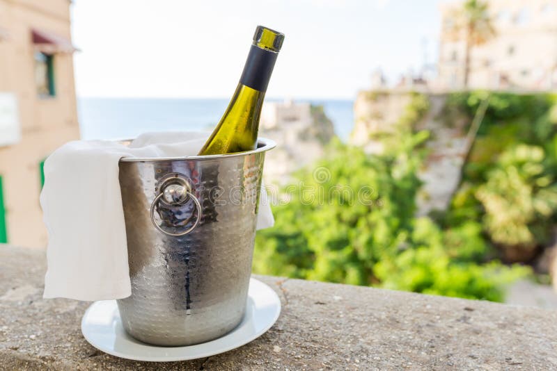 A bottle of wine in an ice bucket