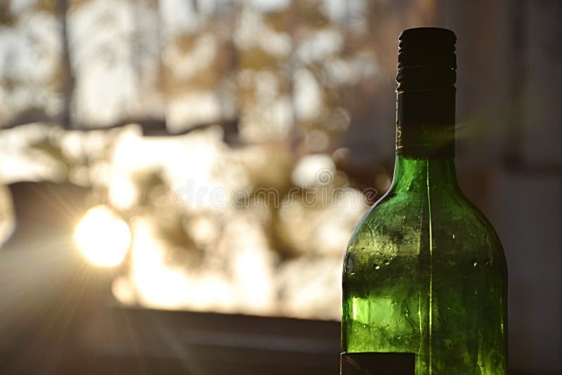 Bottle of wine at sunset