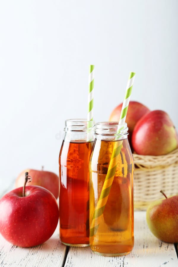 Bottles of apple juice stock image. Image of liquid, healthy 53199761