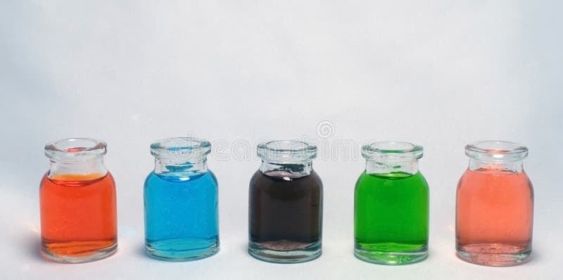 Bottles with colored liquid