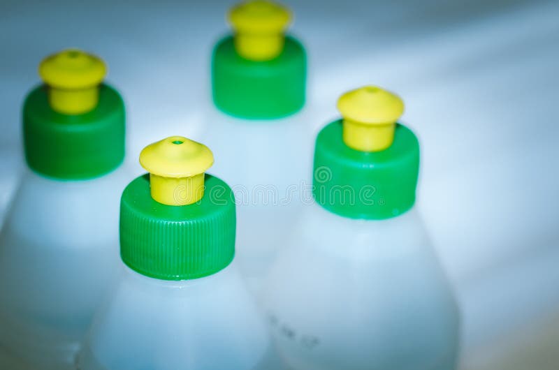 Bottles with Construction Glue/glue in Plastic Bottles, Toned Stock