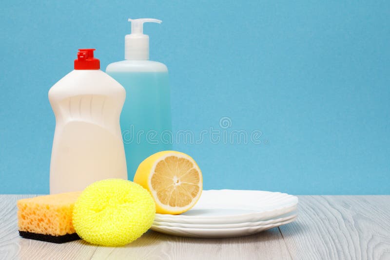 Premium Photo  Yellow sponges for dishwashing on blue background vertical