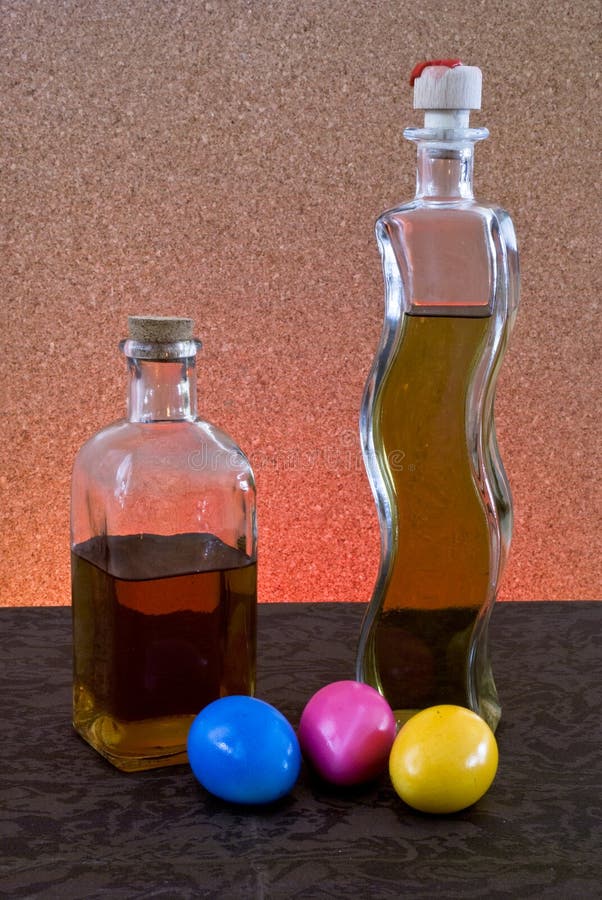 Bottles and Easter eggs stock image. Image of colorful 53555951