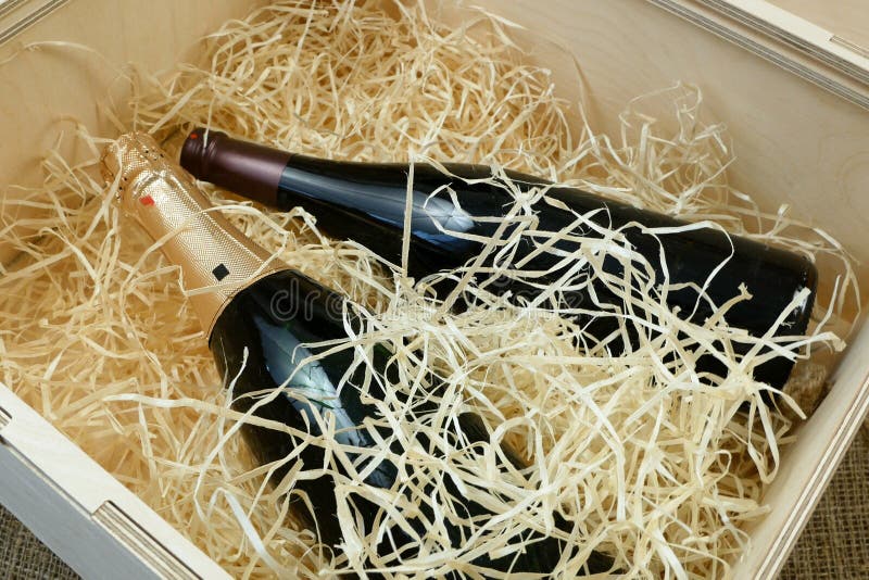 Bottles of Expensive Wine in a Wooden Box with Shavings, Closeup Stock Photo Image of luxury