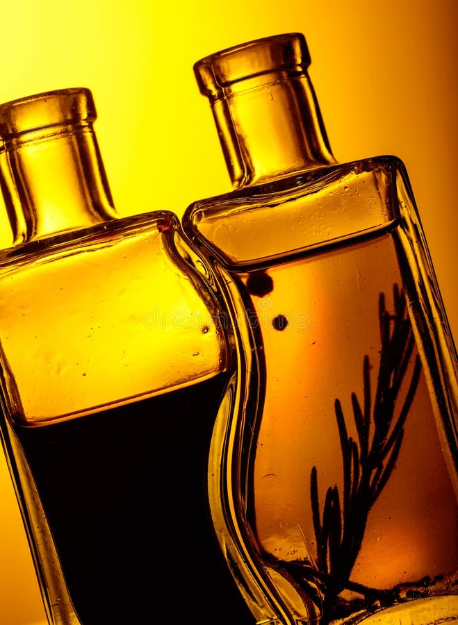 Bottles of Flavored Olive Oil and Balsamic Vinegar . Stock Image