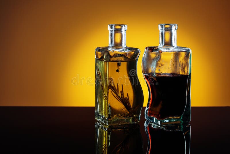 Bottles of flavored olive oil and balsamic vinegar . royalty free stock photo Bottles of flavored olive oil and balsamic vinegar . royalty free stock photo