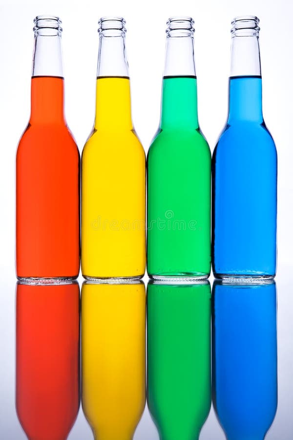 Bottles Red Yellow Green Blue Stock Photo Image of water, four 6263436