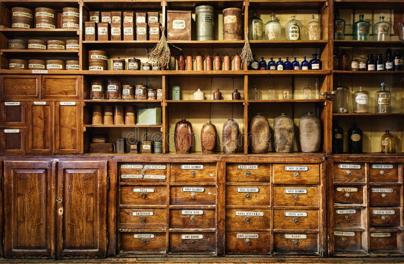 Bottles on the shelf in old pharmacy.