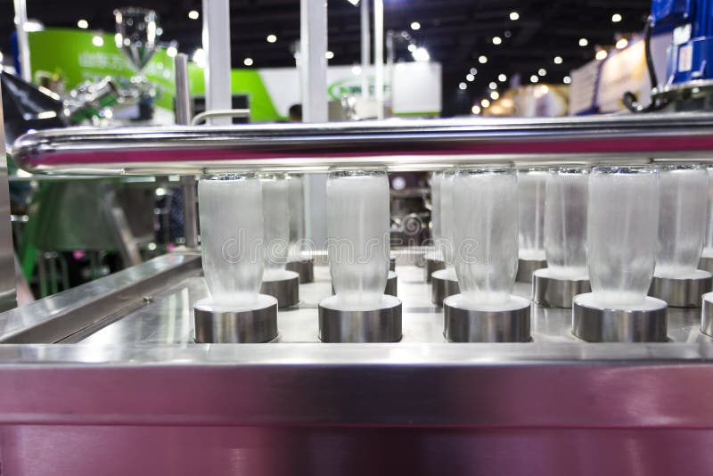 Bottles in washing process royalty free stock photos