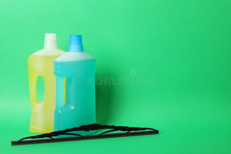 Bottles of Windshield Washer Fluids and Wiper on Yellow Background. Space  for Text Stock Photo - Image of vehicle, space: 214385568