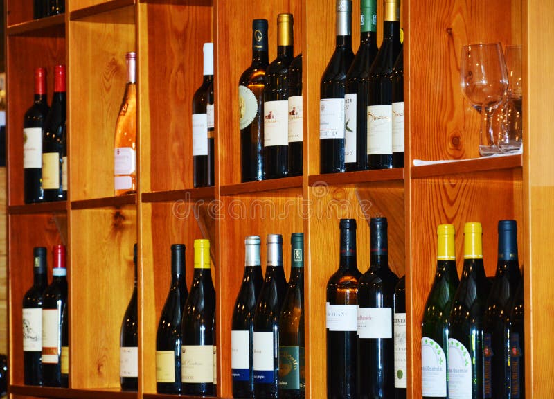 Wine bottles in restaurant editorial stock image. Image of winter