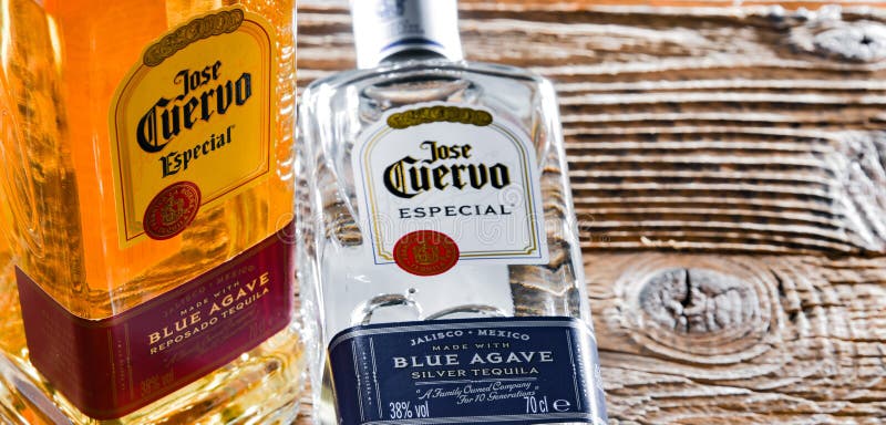 Bottless of Tequila Jose Cuervo on a Wooden Table Editorial Stock Image ...