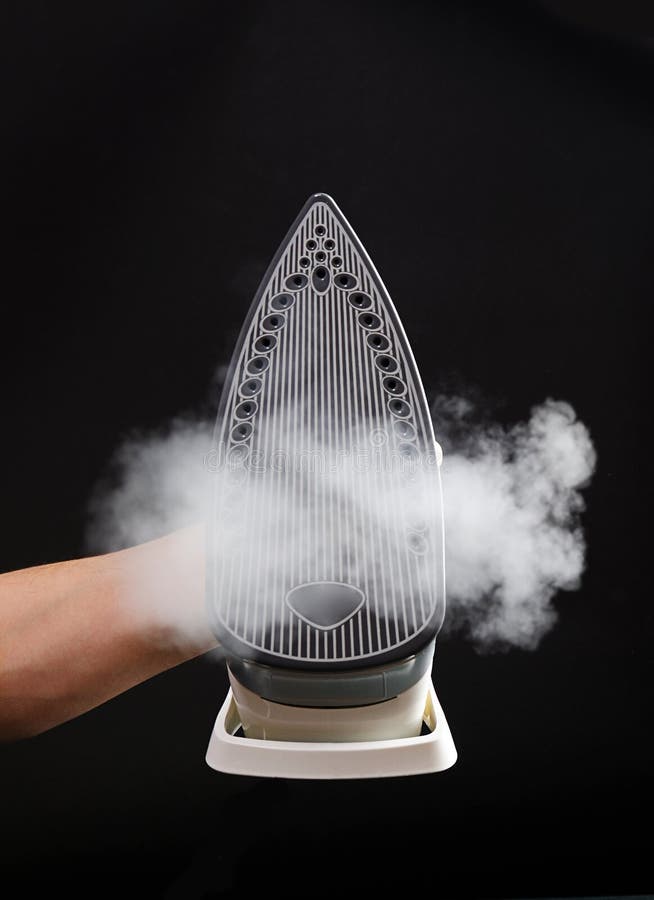 Ironing with steam stock image. Image of electric, black 66146581