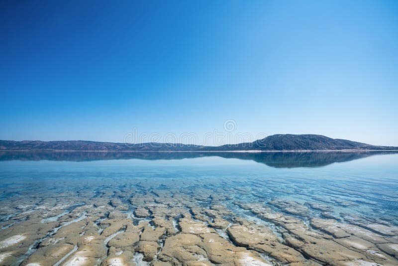 The bottom and surface with crystal clean water of Salda Lake in Turkey. Travel Tourism concept. stock images The bottom and surface with crystal clean water of Salda Lake in Turkey. Travel Tourism concept. stock images