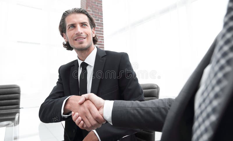 Bottom view. confident handshake of business partners stock photography Bottom view. confident handshake of business partners stock photography