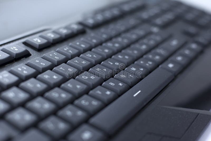 Botón atado con alambre ordenador negro del teclado imágenes de archivo libres de regalías Botón atado con alambre ordenador negro del teclado imágenes de archivo libres de regalías