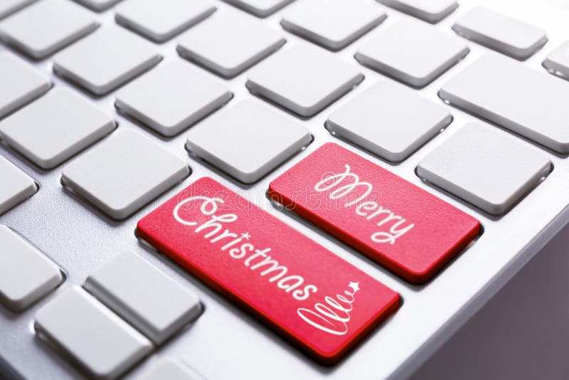 Botón de la Feliz Navidad en el ordenador imágenes de archivo libres de regalías Botón de la Feliz Navidad en el ordenador imágenes de archivo libres de regalías