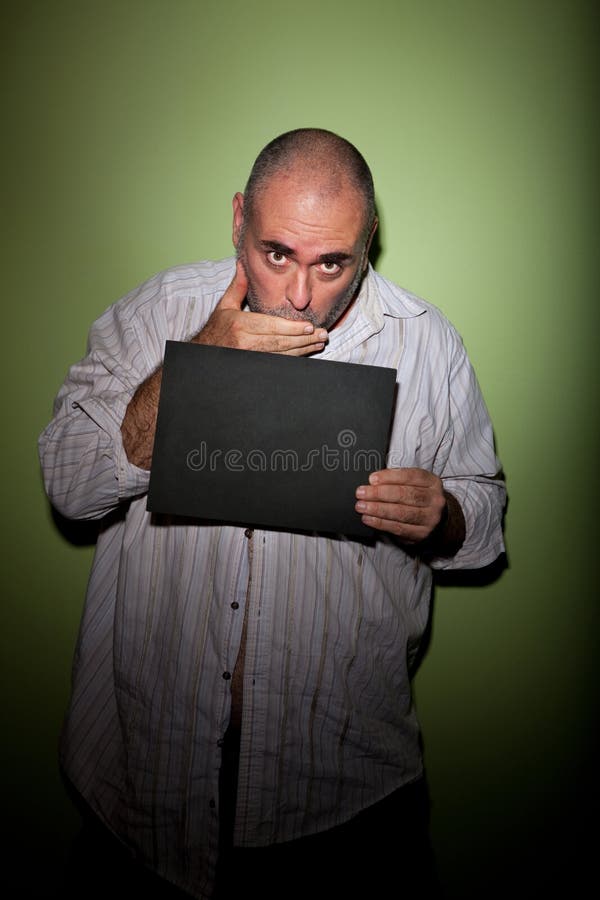 Bouche de revêtement d'homme dans la photo photographie stock libre de droits Bouche de revêtement d'homme dans la photo photographie stock libre de droits