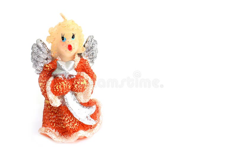 Bougie de Noël sous forme d'ange sur un fond blanc photo libre de droits Bougie de Noël sous forme d'ange sur un fond blanc photo libre de droits