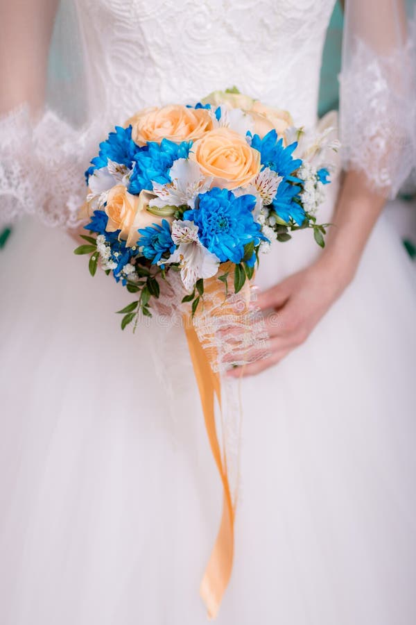 Bouquet of the bride in the hands of wedding rings. the bride is holding a bouquet. royalty free stock photos Bouquet of the bride in the hands of wedding rings. the bride is holding a bouquet. royalty free stock photos