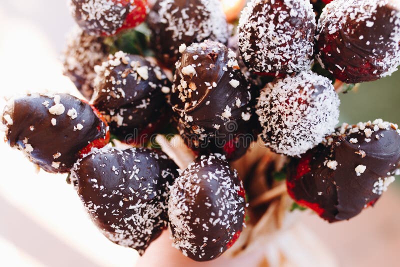 A Bouquet of Chocolate Covered Strawberries with Different Toppings