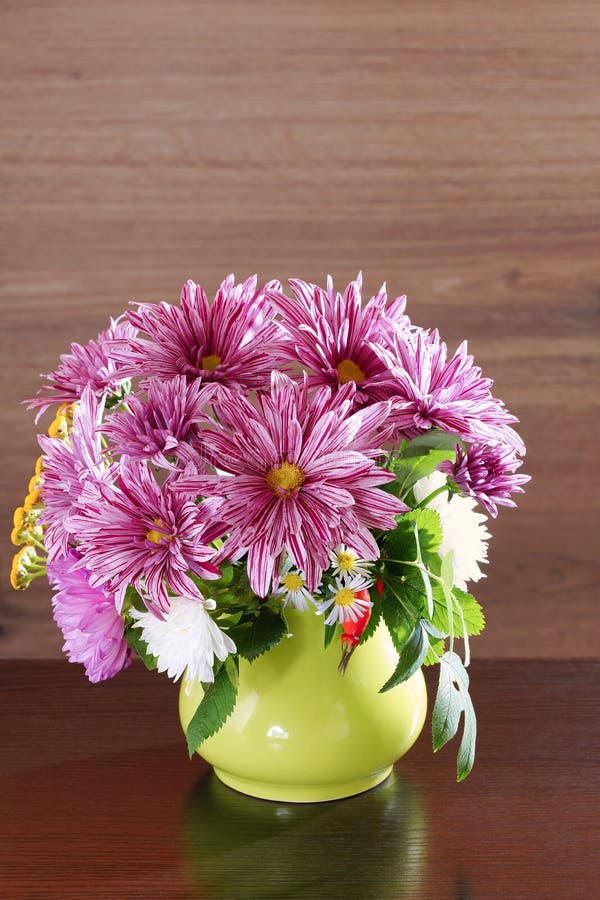 Bouquet of Chrysanthemum in a Green Vase Stock Photo - Image of wooden ...