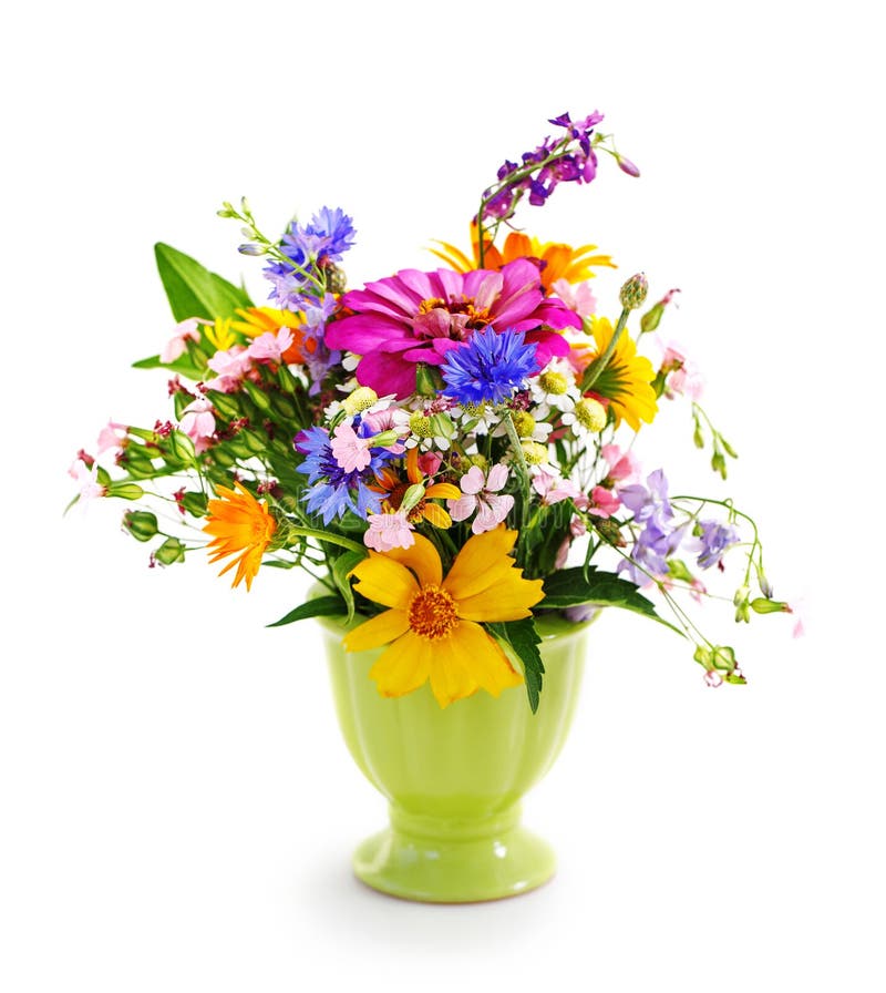Bouquet des fleurs dans le vase vert