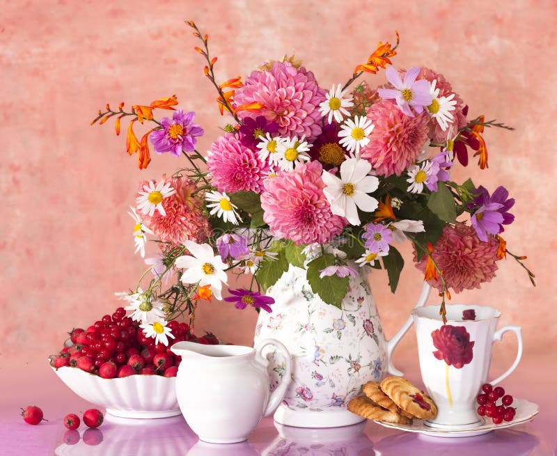 Bouquet of flowers and cup