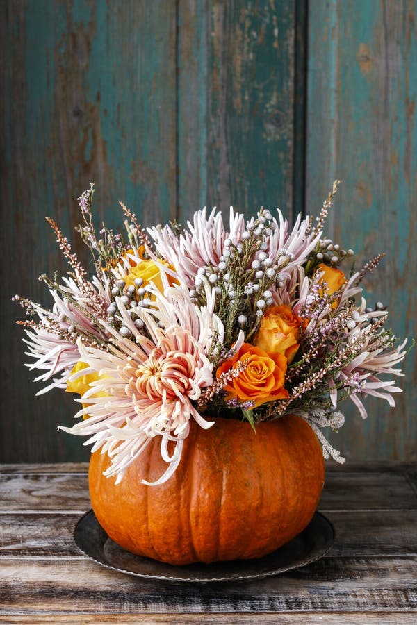 Bouquet of Flowers in Pumpkin Stock Image Image of floral, heather