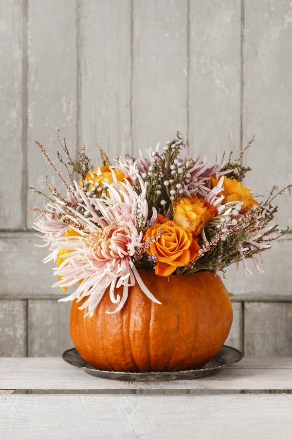 Bouquet of Flowers in Pumpkin Stock Image - Image of home, fall: 118299169