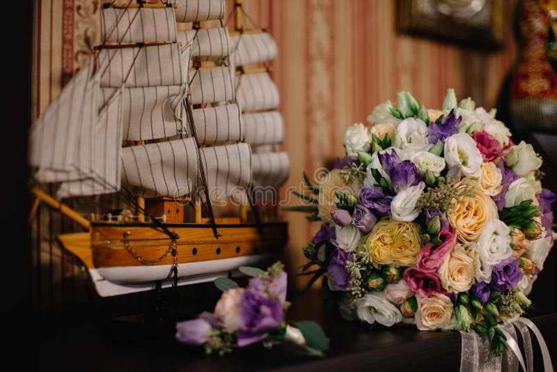 wedding bouquet on the ship`s deck. wedding bouquet on the ship`s deck.