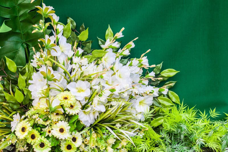 Bouquet in a plastic glass stock photo. Image of green 63813354