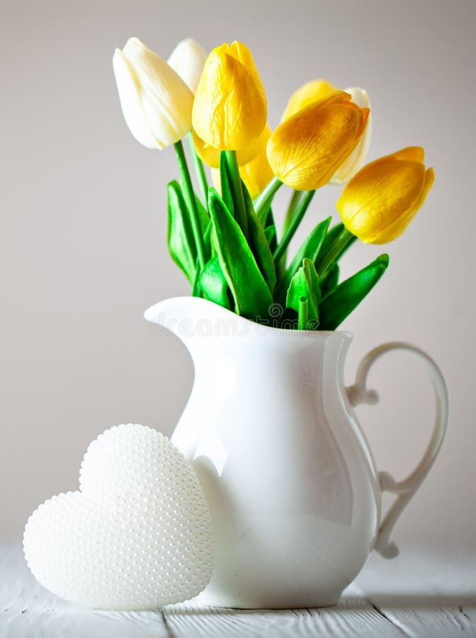 Bouquet of spring tulips on a bright background. Greeting card. stock photo