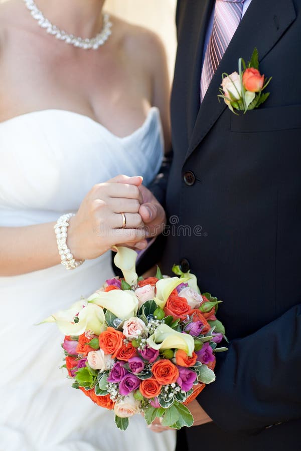 Bouquet and wedding ring