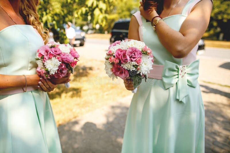 Bridesmaids with flowers stock photo. Image of marriage 24575622